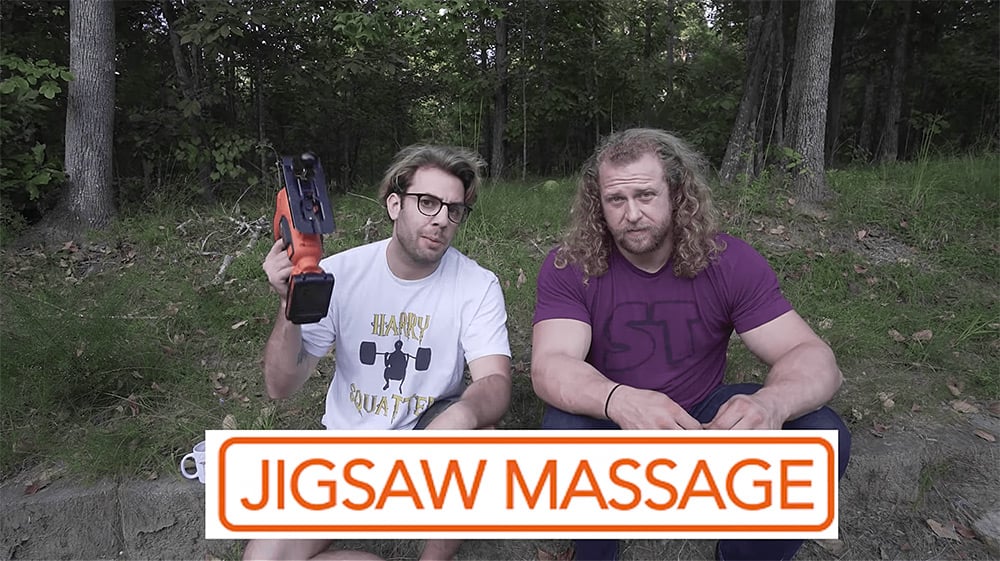 Tom Boyden holding a Jigsaw Massage gun