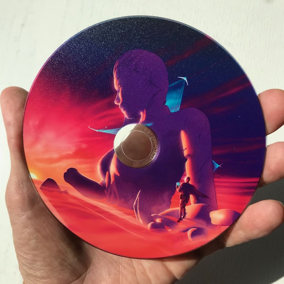 Color Theory's CD held in a palm
